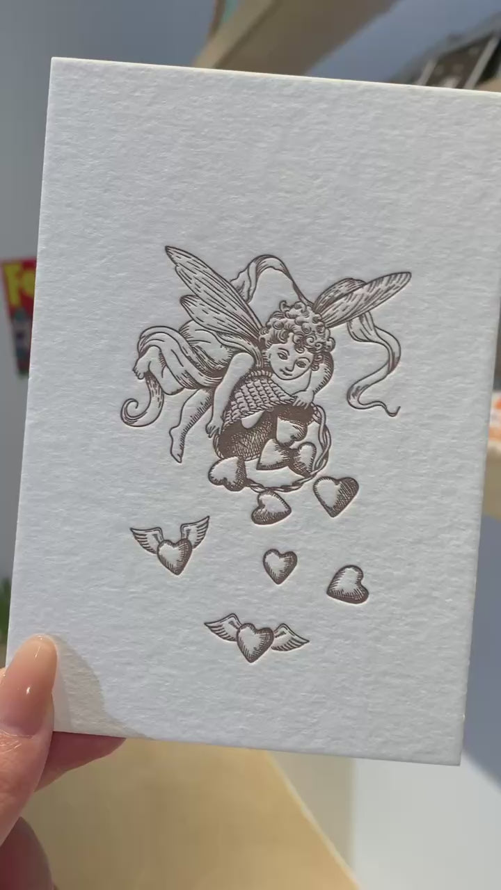 A video of the cherub and heart card