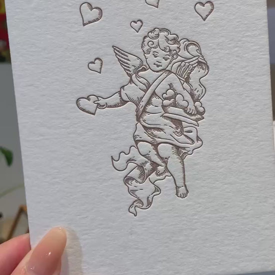 A video of the Cupid and heart card