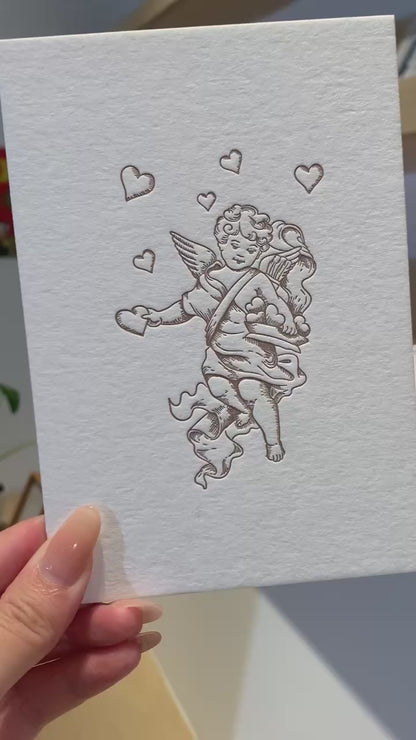 A video of the Cupid and heart card